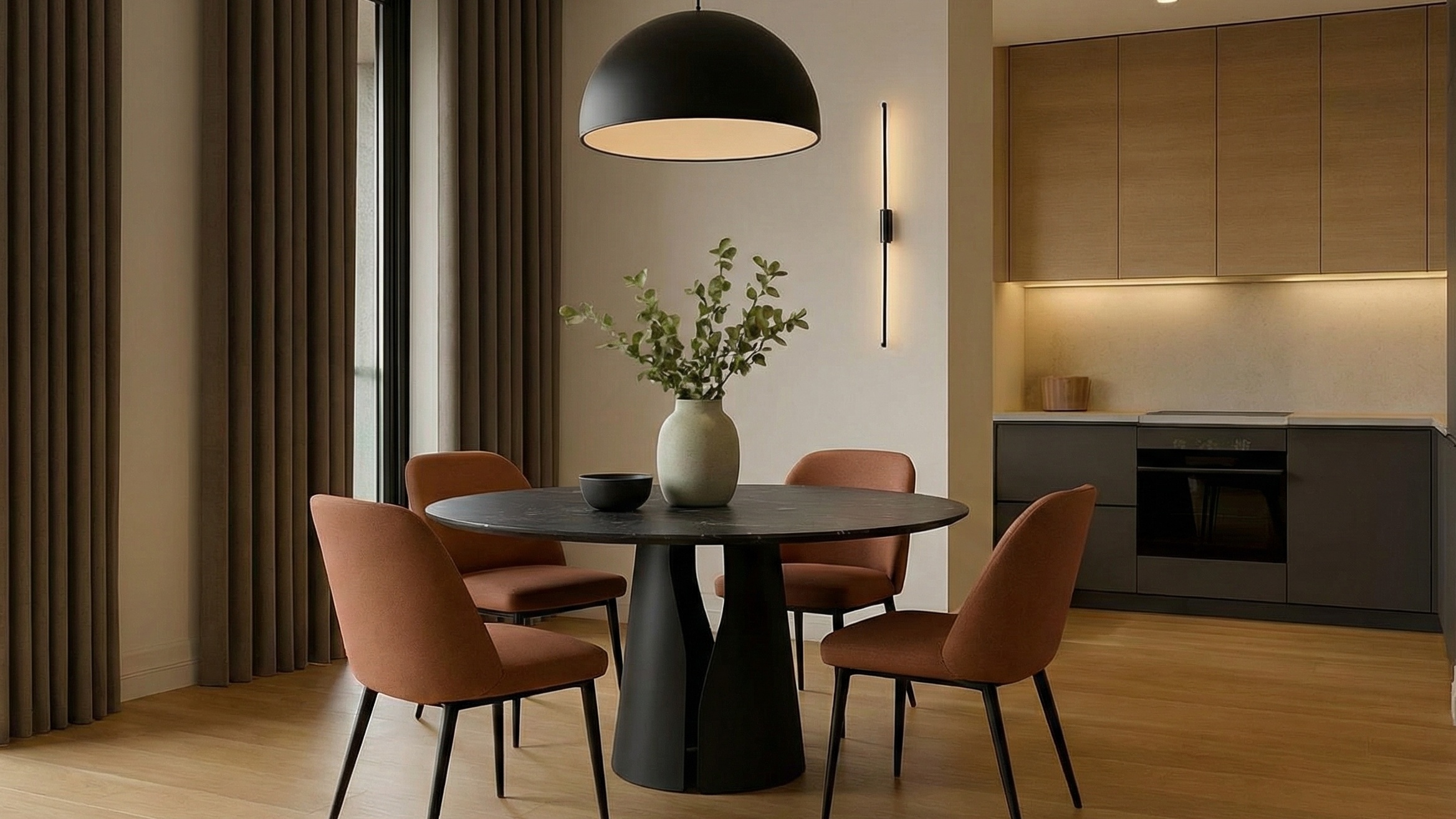 Обеденный стол Beato на активно используемой кухне https://caralan.ru/products/stol-beato-s-chyornoy-keramicheskoy-stoleshnicey-diametrom-120-sm-podstole-metall-chyornoe